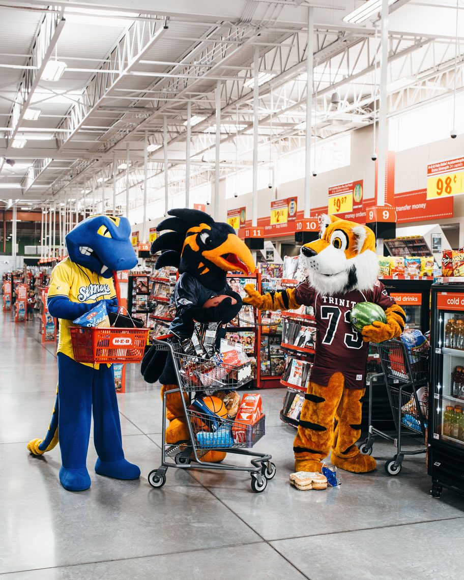 College Guide Cover at HEB with mascots from Trinity University, University of Texas at San Antonio, and St. Mary