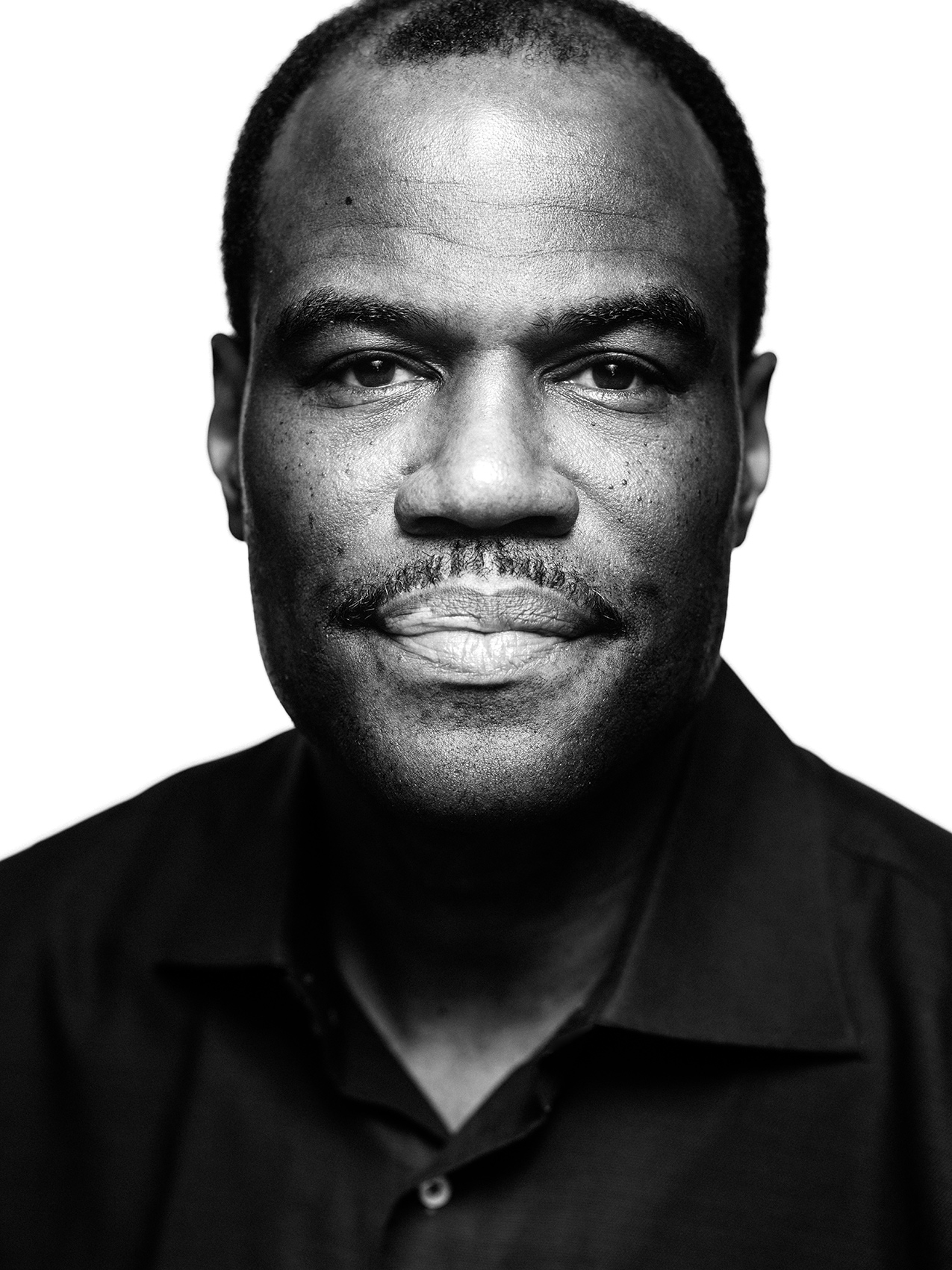 San Antonio Spurs and NBA legend, David Robinson, photographed in San Antonio, TX by sports portrait photographer, Josh Huskin.